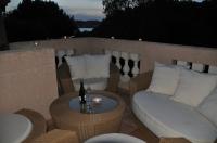 Ferienhaus Villa Calma in Costa de la Calma Mallorca, sehr schnes Reihenhaus mit 4 Schlafzimmern und herrlicher Poollagune, direkt am Meer und nur wenige Meter zum Sandstrand